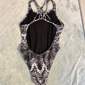 SUPER RARE jolyn Ryker print onesie